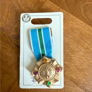 Disney Gold Medal with Blue and Green Ribbon